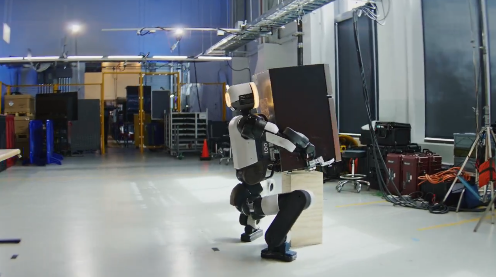 Boston Dynamics latest robots can lift seeminly impossible items like mini fridges.